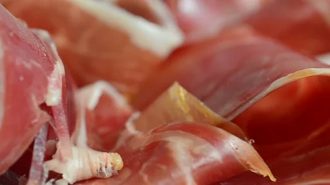 Jamon on the plate. Shooting in motion. Vídeo Stock 151714654