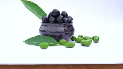 Jamun fruit in a bowl also called as java plum, jambolan plum, jambhul, syz.. Stock Footage 249935173