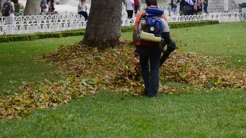 Janitor is cleaning in park Stock Footage