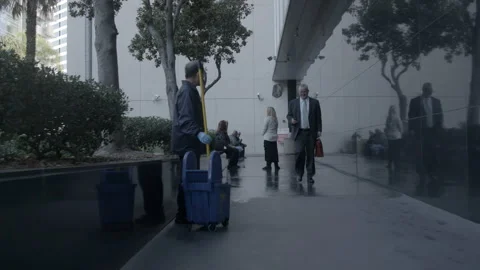 Janitor Mopping Sidewalk Outside Building Stock Footage 343960870