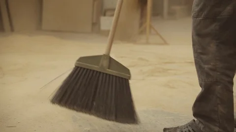 Janitor sweeping dust Stock Footage 128369636