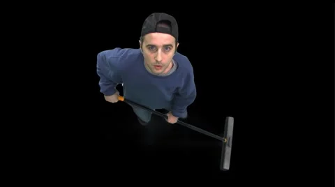 Janitor Sweeping--Looks Up Stock Footage 5163522