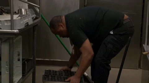 Janitor working at kitchen, cleaning (variant). Stock-Footage 76718875