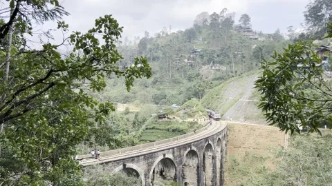 January 20 2026 train entering Nine Arch Bridge Ella Sri Lanka Video stock 331710976