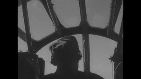 Japan 1940s: The underside of a B-29 bomber in flight, showing the fuselage, Stock Footage 344138676