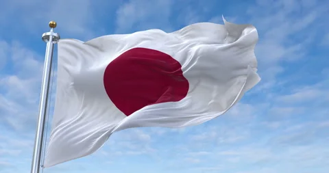 Japan flag with flagpole waving in rolling clouds looping, 4K (Perfect Loop) Video stock 277353973