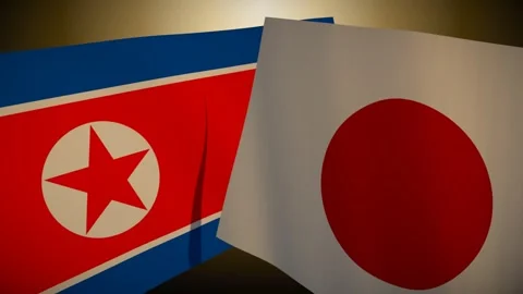 Japan Flag Rippling In Front Of North Korea With Its Shadow Sweeping The Cloth Vidéo 344705937