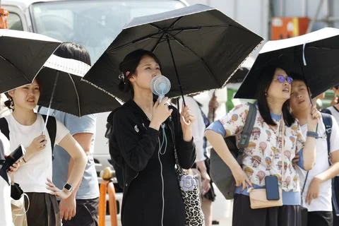 Japan issues heatstroke alerts on second 'brutally' hot day, Tokyo - 22 Jul 2026 Stock Photos