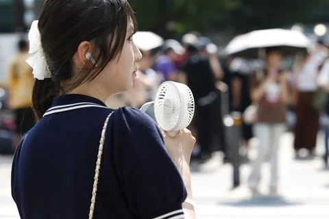 Japan issues heatstroke alerts on second 'brutally' hot day, Tokyo - 22 Jul 2026 Stock Photos