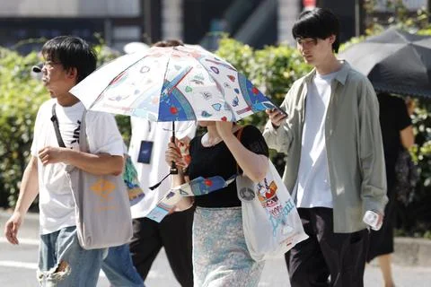 Japan issues heatstroke alerts on second 'brutally' hot day, Tokyo - 22 Jul 2026 Stock Photos