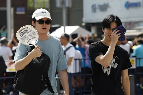 Japan issues heatstroke alerts on second 'brutally' hot day, Tokyo - 22 Jul 2026 Stock Photos
