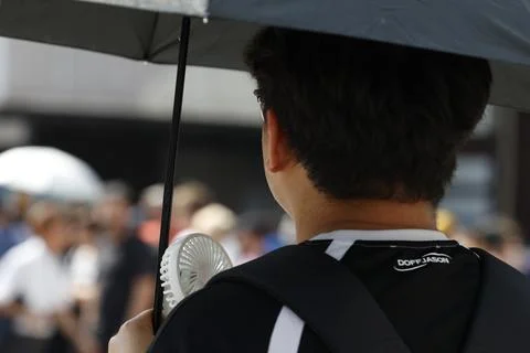 Japan issues heatstroke alerts on second 'brutally' hot day, Tokyo - 22 Jul 2026 Stock Photos