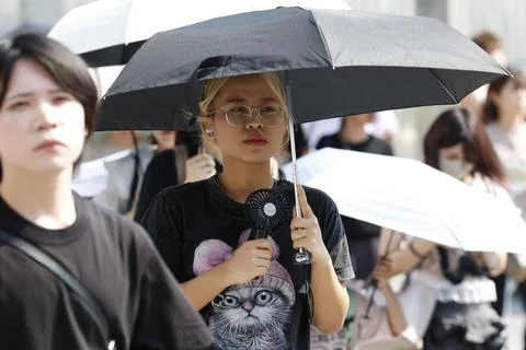 Japan issues heatstroke alerts on second 'brutally' hot day, Tokyo - 22 Jul 2026 Stock Photos