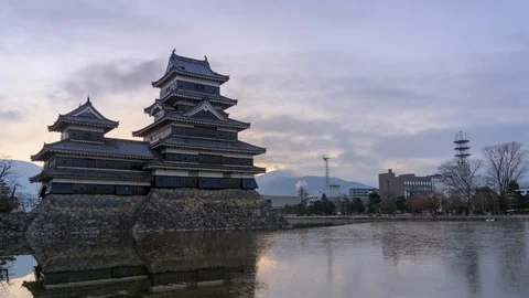Japan Matsumoto Castle hyper lapse sunrise 4K Stock Footage 103993552
