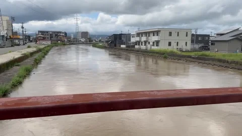 Japan: Record Rain Triggers Highest-Level Emergency Warning in Fukui 2 Stock Footage 344032197