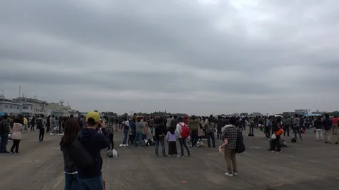 JAPAN : “RF-4E” flying above the crowd of people. Stock Footage 119865425