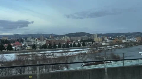 Japan Sendai Winter River View from Moving Train Window Stockbeeldmateriaal 345621508
