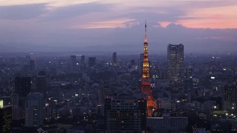 Japan Tokyo Aerial v142 Flying low along Minato cityscape Tokyo tower dusk Stock Footage