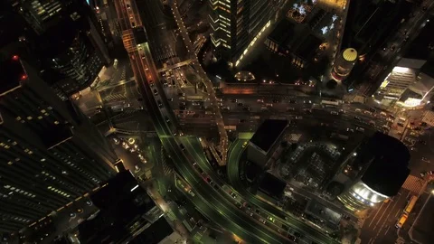 Japan Tokyo Aerial v150 Birdseye view flying low over Ginza area night Stock Footage