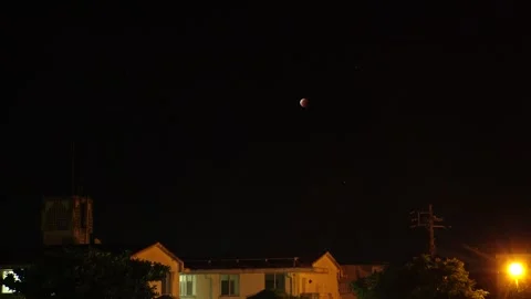 JAPAN : Total eclipse of super blood moon seen in northern Japan and Okinawa. Stock Footage 249564857