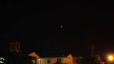 JAPAN : Total eclipse of super blood moon seen in northern Japan and Okinawa. Stock Footage 249564935