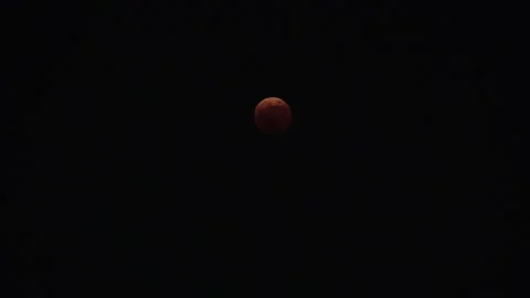 JAPAN : A total lunar eclipse coinciding with a lunar occultation of Uranus. Stock Footage 249567658