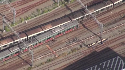 Japan: Train collides with out-of-service train near Tokyo Stock Footage 320791466