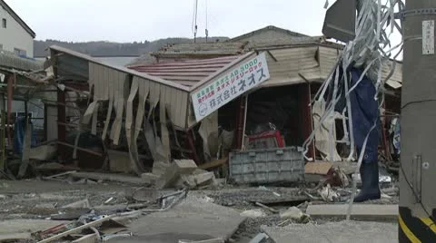 Japan Tsunami Aftermath - Flattened Industrial Building Near Coast Stock Footage
