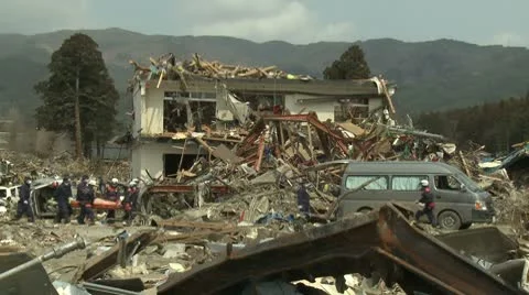 Japan Tsunami Aftermath - Rescue Crew Attend To Dead Body In Rikuzentakata City Stock Footage