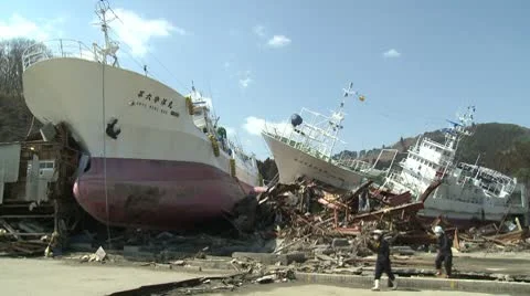 Japan Tsunami Aftermath - Ships Smashed And Washed Ashore Stock Footage