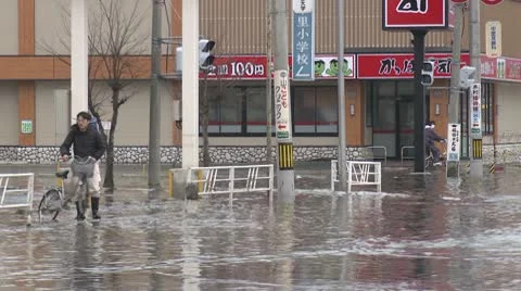 Japan Tsunami Aftermath - Tidal Flooding In Downtown Ishinomaki City Stock Footage