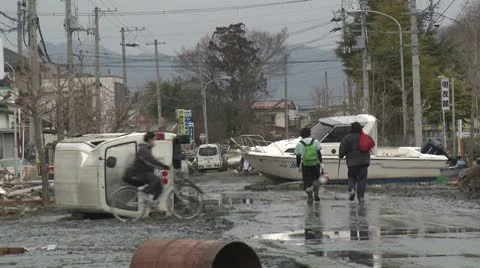 Japan Tsunami Aftermath - Vehicles And Boat Block Street Stock Footage