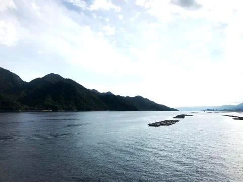 Japan, view from the lake to the mountains. Stock Photos