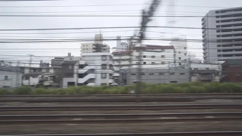 Japan view from the train window. Suburb of Tokyo. Japan railways. Stock Footage 91846768