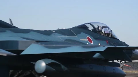 Japanese Air Self Defence Force F-2A pilot taxiing Video stock 168292953