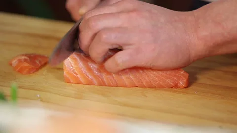 Japanese chef makes sashimi to make sushi 02 Stock Footage 144513052