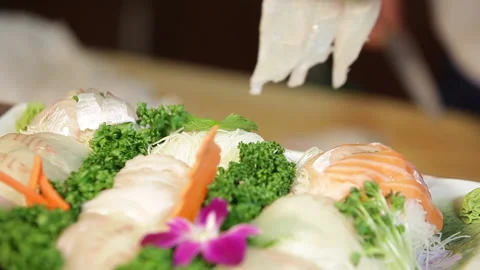 Japanese chef makes sashimi to make sushi 04 Stock Footage 144513105