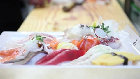 Japanese chef makes sashimi to make sushi 03 Stock Footage 144513319