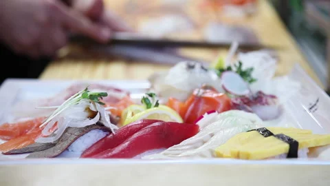 Japanese chef makes sashimi to make sushi 05 Stock Footage 144513735