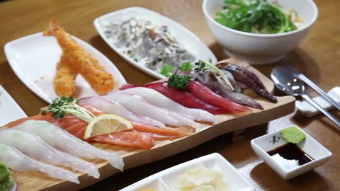 Japanese chef makes sashimi to make sushi 09 Stock Footage 145703250