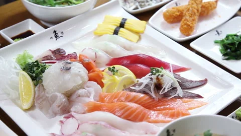 Japanese chef makes sashimi to make sushi 12 Stock Footage 145703299