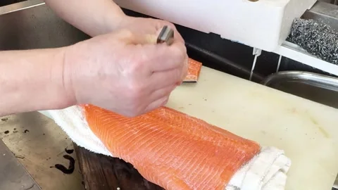 Japanese Chef Removing Pin Bones From A Fresh Salmon Fillet, Japan Stock Footage 340603993