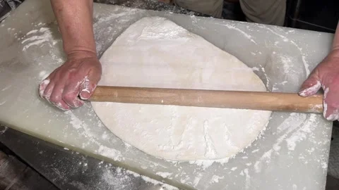 Japanese Chef Rolling Out Handmade Udon Noodle Dough with Rolling Pin, Japan Stock Footage 343792461