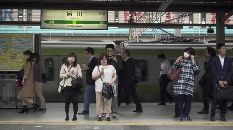 Japanese Commuters in Slow Motion at Train Station Stock Footage 58720109