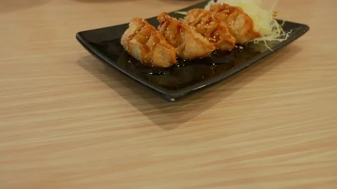 Japanese dumpling, Deep fried Gyoza traditional japanese food. Stock Footage 81613232