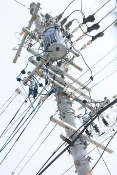 Japanese electric pole white with many wires Stock Photos