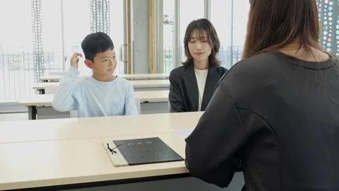 Japanese Elementary School Boy Attending School Interview with His Mother Stock-Footage 344096221