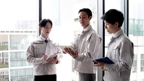 Japanese Factory Workers Discussing Work with Tablet and Documents Stock-Footage 344041435