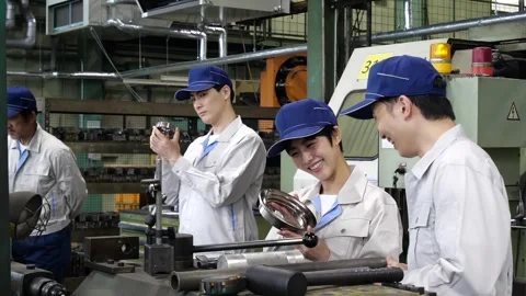 Japanese Factory Workers Inspecting Precision Lathe Machined Part Stock-Footage 344062886