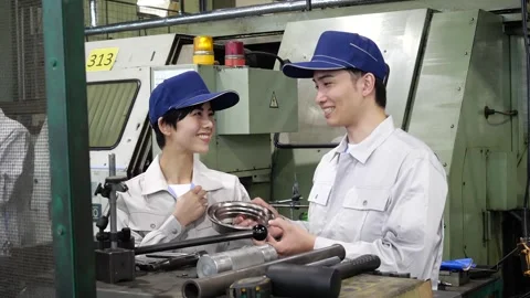 Japanese Factory Workers Inspecting Precision Lathe Machined Part Stock-Footage 344065391